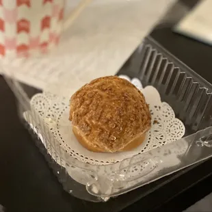 a pastry in a plastic container