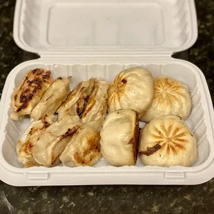 Dumplings: pork with dill + ginger + green onions Pan fried bao (ground beef + noodles + ginger)