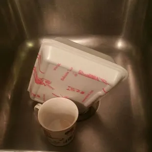 Trying to drain the oil out of this lo-mein.