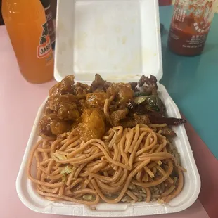 Orange chicken, chicken with jalapeños and noodles with a side of fried chicken which didn't fit in my plate