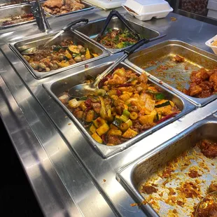 a buffet with many different types of food