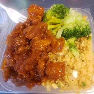Orange chicken, fried rice, and steamed vegetables Lunch Combo