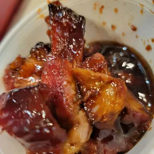 a bowl of meat and sauce