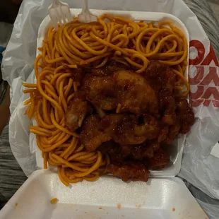 a plate of spaghetti and meat