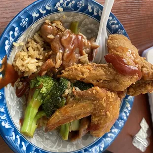 a bowl of fried chicken and rice