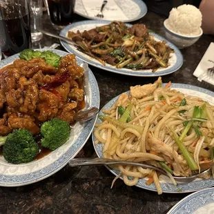 C5. Orange Flavor Chicken, 93. Mongolian Beef, and 25. Chicken Udon