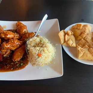 Braised chicken with fried rice and crab Rangoon