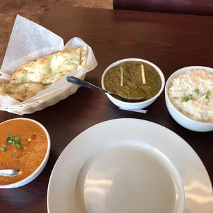 Chicken Tikka Masala, garlic naan, palak paneer.