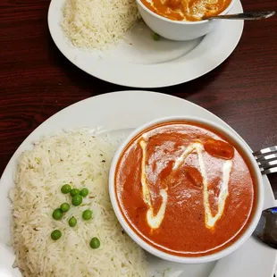 Top: Chicken Tikka Masala, Bottom: Butter Chicken. Tikka slightly less rich + more tomato-y than Butter. Both DELICIOUS!!