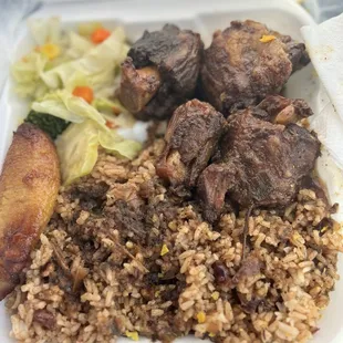 Oxtails, Plantain Rice and Peas with vegetables