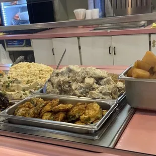 Banchan selection- shoyu potato, zucchini, mayo potato, chap chae, Mac salad, tofu, seaweed.