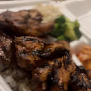 Spicy Bbq Chicken meal with broccoli, kimchi and bean sprouts