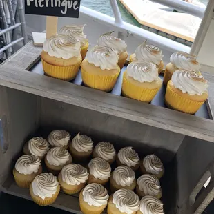 a display of lemon meringue cupcakes