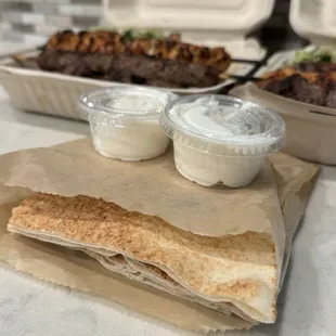 Pita bread with garlic sauce. Both come with the entree.