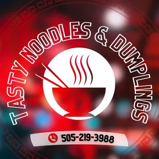 a bowl of soup with chopsticks