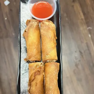 a person holding a plate of food