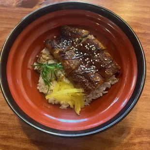 a plate of food on a wooden table