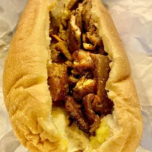Grilled pork Banh mì was loaded w/Grilled pork. Re-heated nicely in the oven OuiOui. Trying the chicken Banh me next time :)..