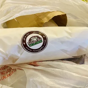 Grilled pork banh mi to go.