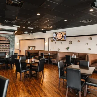 a restaurant with wood floors