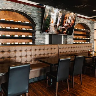 a restaurant with a long table and chairs