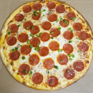 a pepperoni pizza in a box