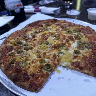 Pepperoni, green olives and pineapple. Built to order.
