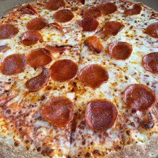 a pepperoni pizza in a box