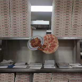 a pizza hanging from the ceiling