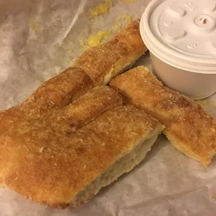 Garlic bread with marinara sauce.