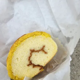 a piece of cake with a smiley face drawn on it