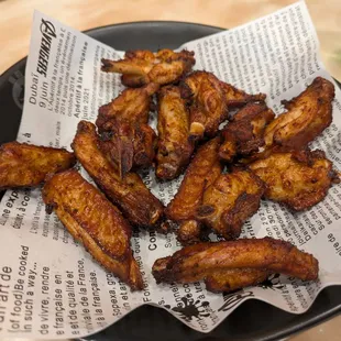 AP08 New Orleans Chicken Wings (12 for $10.95) - 4 stars. Tender and flavorful, and kids liked it. Sat lunch 2025-01-18