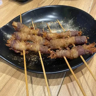 B12. Beef and Enoki Mushroom Wrapped Skewer