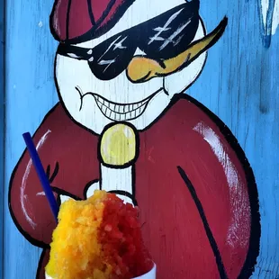 a cup of ice cream with a straw