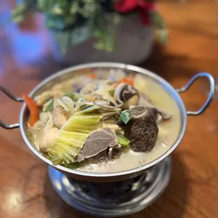 a bowl of soup on a table