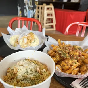 Shrimp Poboy, French quarter fries, Crawfish Pasta