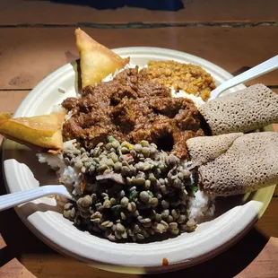 Delicious Ethiopian beef stew with Ingera bread and rice