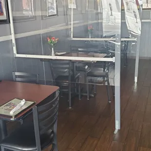 Plastic barriers between tables