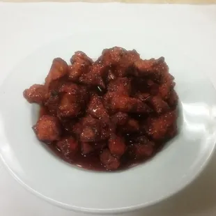 Lightly battered fried chicken (Kai Tod) topped with sweet and spicy sauce