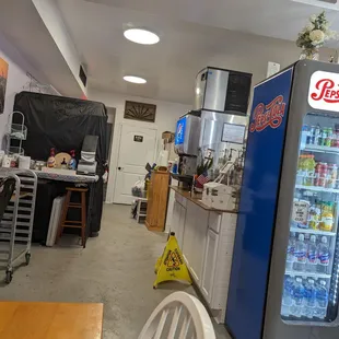 a view of the kitchen and dining area