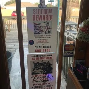 Pee wee Herman&apos;s bike reward poster and Run dmc poster