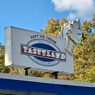 a sign for a tastyland restaurant