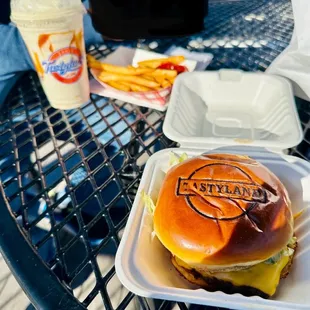 Cheeseburger, fries, apple cider milkshake.