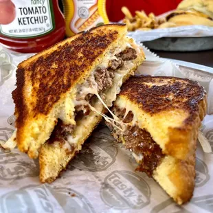 Tastys Melt $6.5  ¼ lb. beef burger I provolone I sautéed onion I Tasty's Sauce I buttered toast