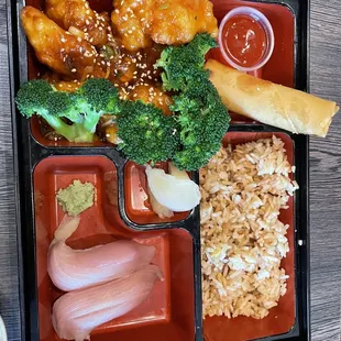 Lunch bento- Crispy Sesame Chicken, Shanghai spring roll, fried rice, yellowtail nigiri