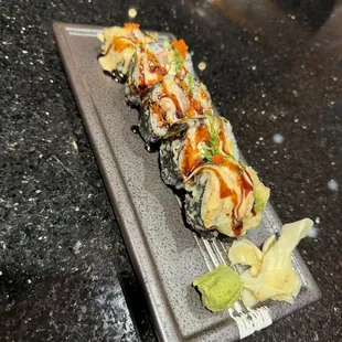 a sushi roll on a plate