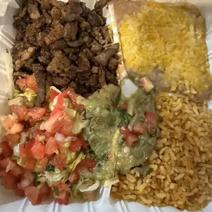 Carne asada plate looks ok but old guac old rice everything tasted like gas fumes.