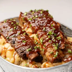 ribs and macaroni in a pan