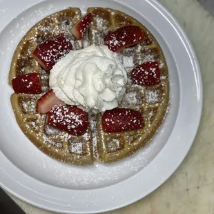Strawberry waffle with whipped cream
