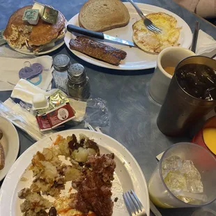 Corn beef hash, eggs, home fries, hot Italian sausage, rye toast, "dippy" eggs, coffee, orange juice